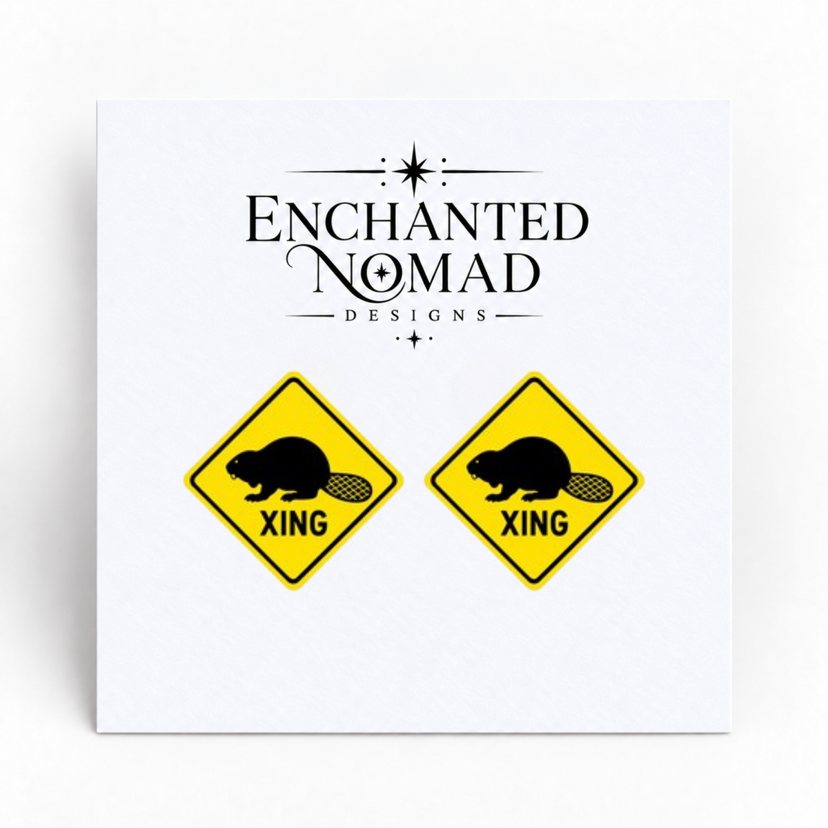 Beaver Crossing Sign graphic earrings on display card