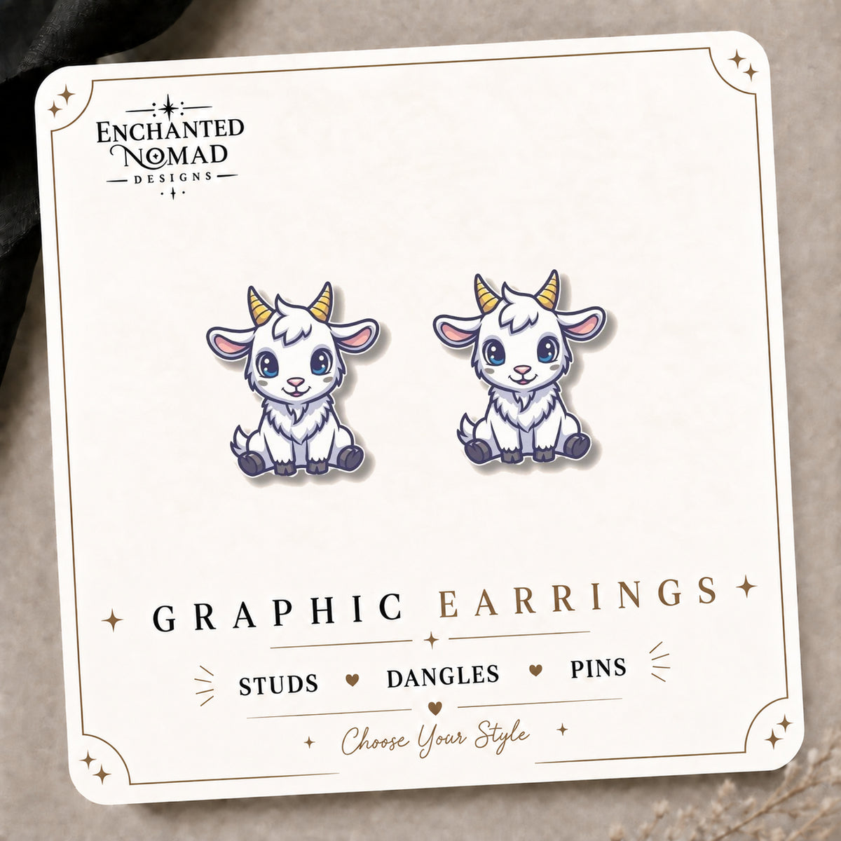 Baby Goat Stud Earrings on the tilted Enchanted Nomad Designs card