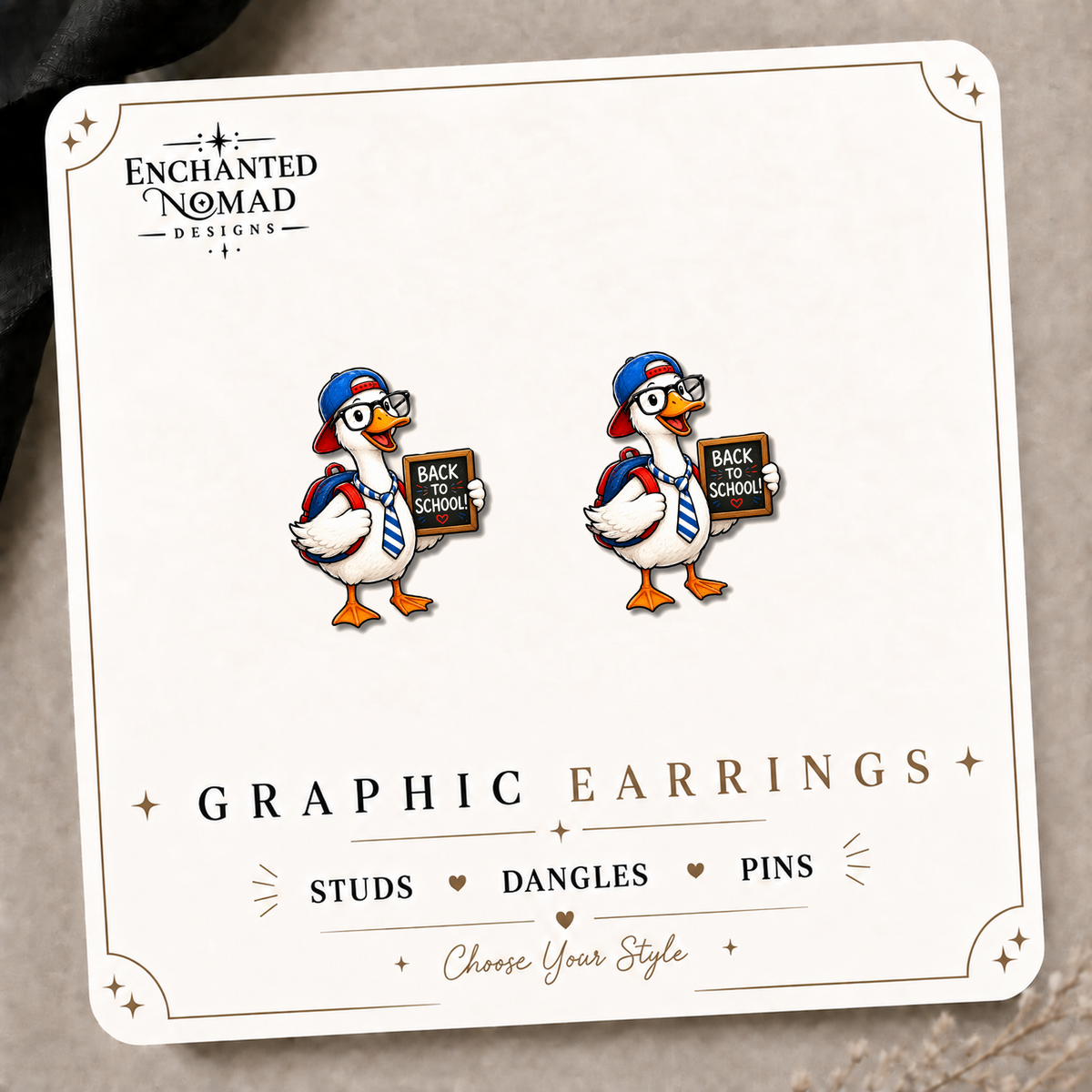 Back to School Goose Stud Earrings on the tilted Enchanted Nomad Designs card