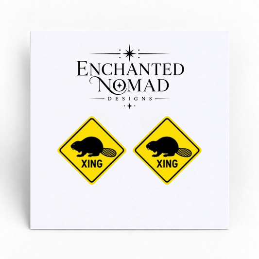 Beaver Crossing Sign graphic earrings on display card