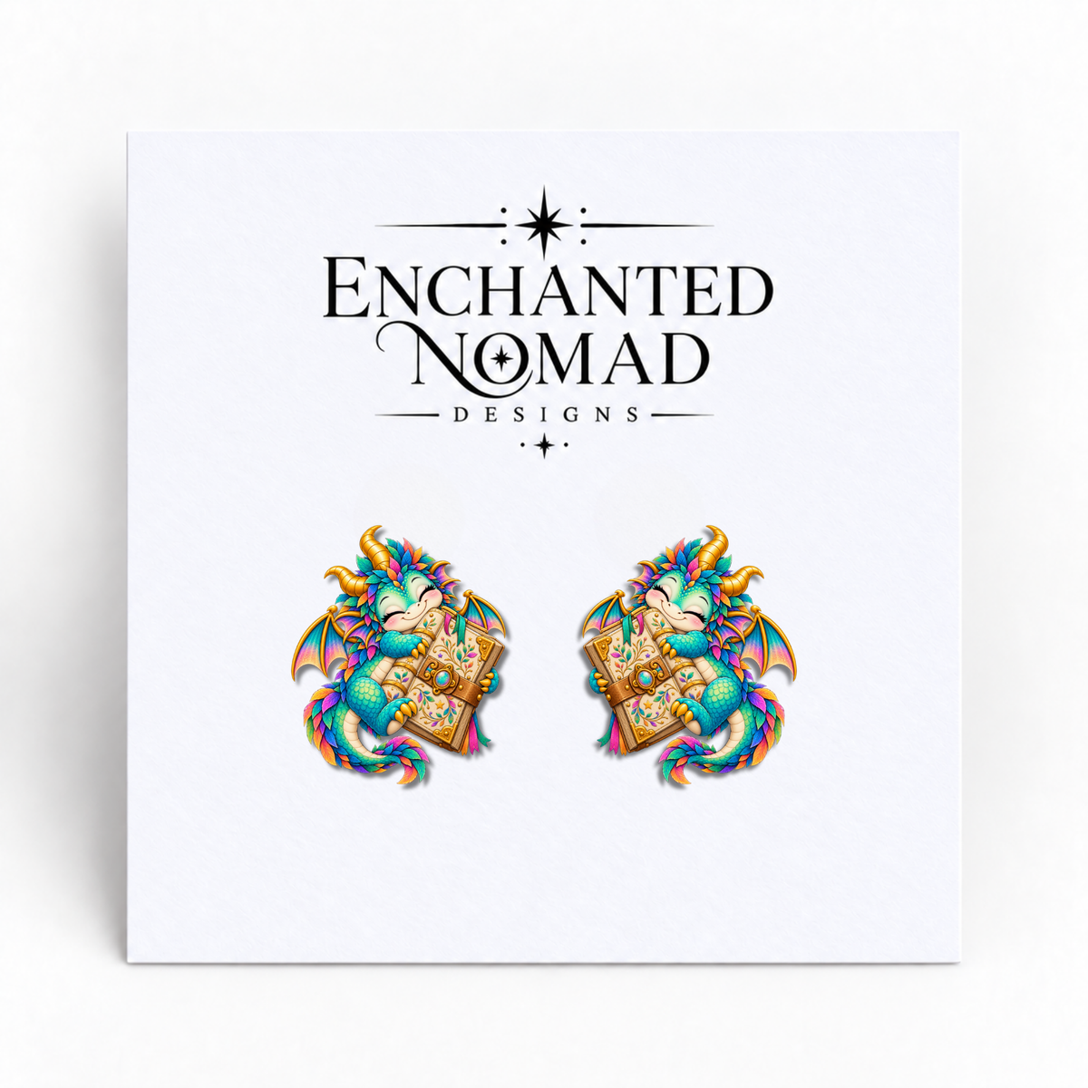 Book Hugging Dragon graphic earrings on display card