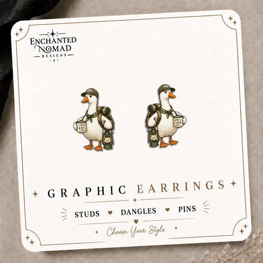 Camping Goose Stud Earrings on the tilted Enchanted Nomad Designs card