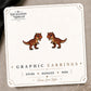 Carnotaurus Stud Earrings on the tilted Enchanted Nomad Designs card