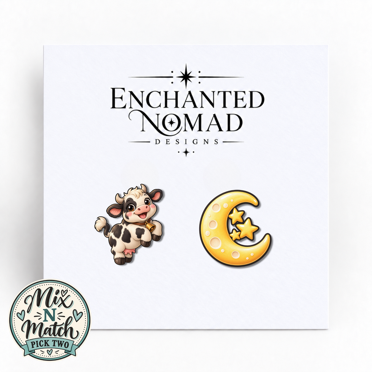 Cow and Crescent Moon graphic earrings on display card