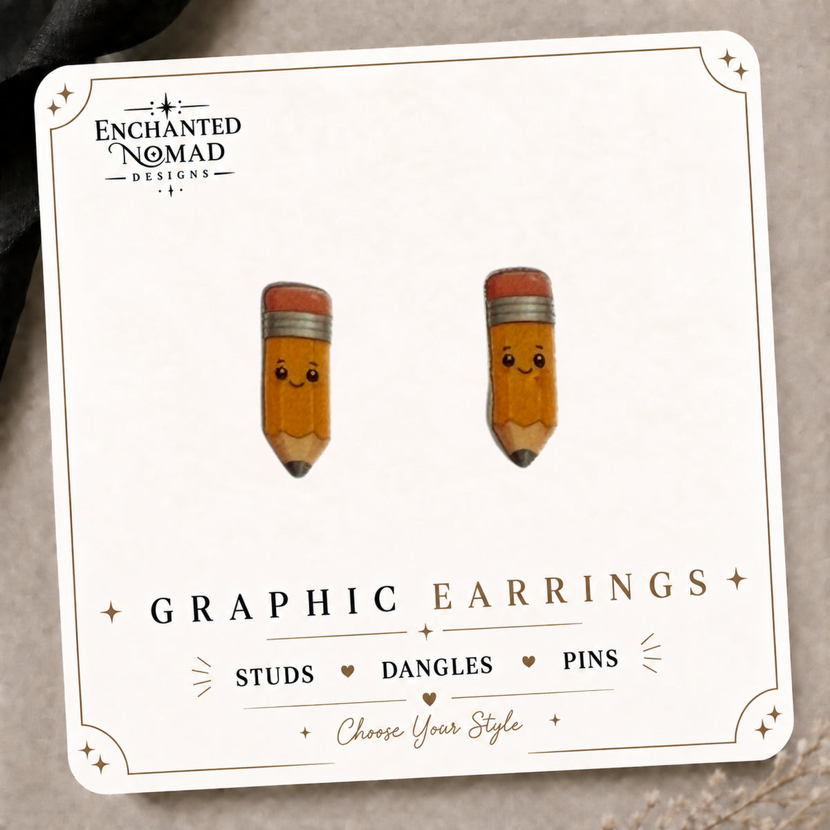 Cute Pencil Stud Earrings on the tilted Enchanted Nomad Designs card