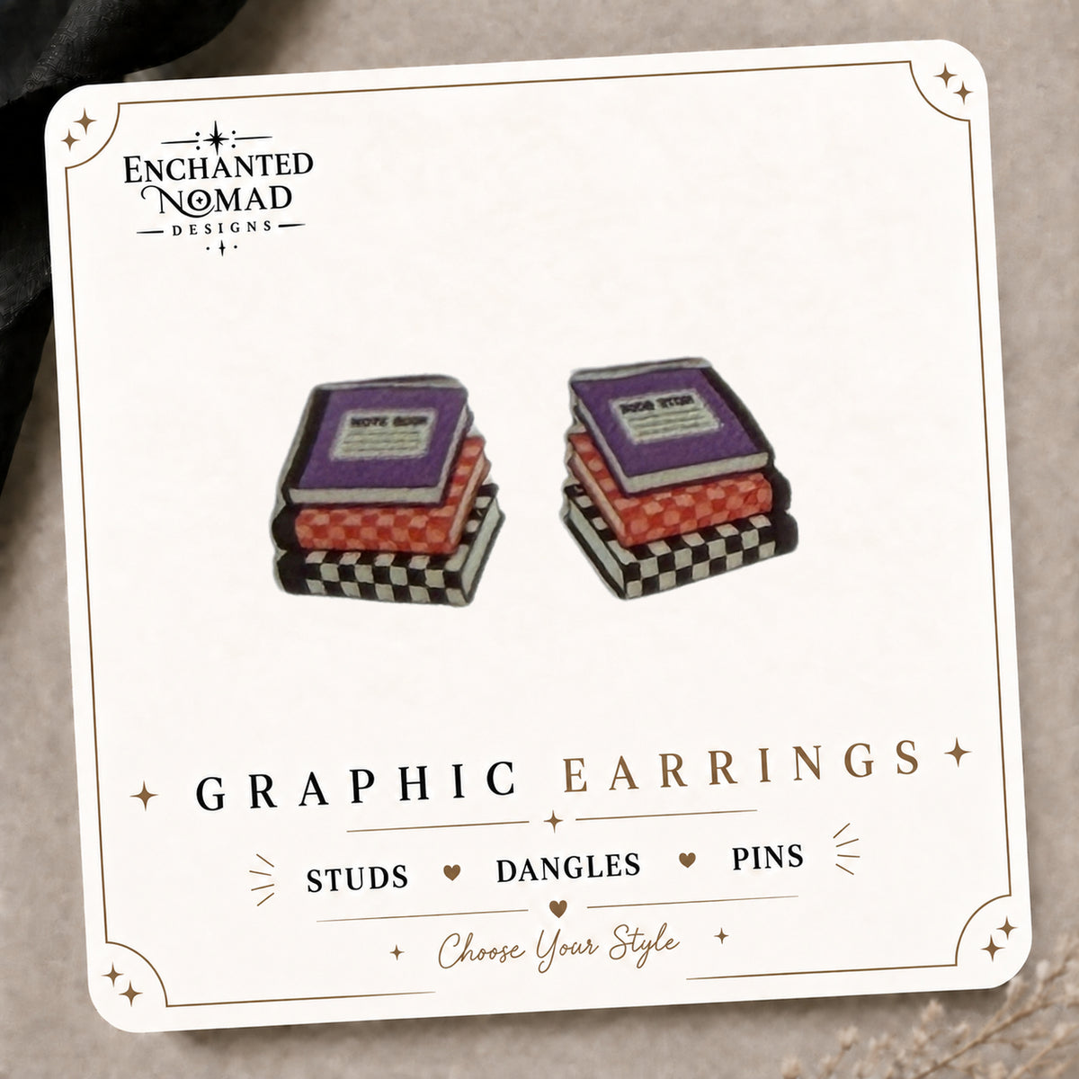 Cute Stack of Books Stud Earrings on the tilted Enchanted Nomad Designs card