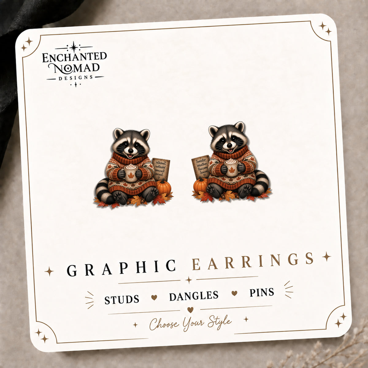 Fall Raccoon Stud Earrings on the tilted Enchanted Nomad Designs card