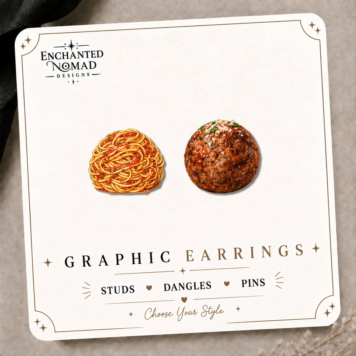 Funny Spaghetti & Meatball Stud Earrings on the tilted Enchanted Nomad Designs card