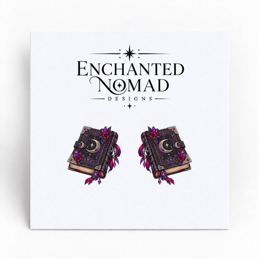 Gothic Moon Spellbook graphic earrings on display card