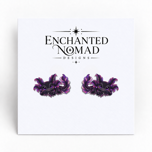 Gothic Purple Axolotl graphic earrings on display card