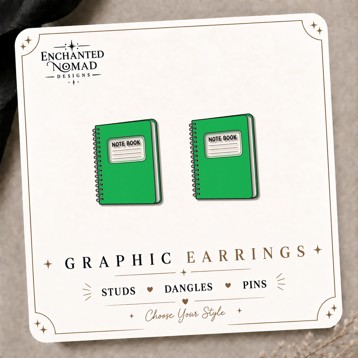 Green Spiral Notebook Stud Earrings on the tilted Enchanted Nomad Designs card