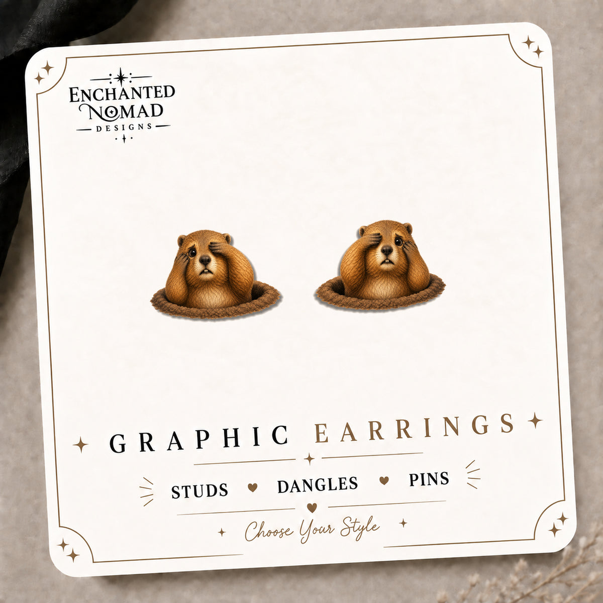 Groundhog Peeking Stud Earrings on the tilted Enchanted Nomad Designs card