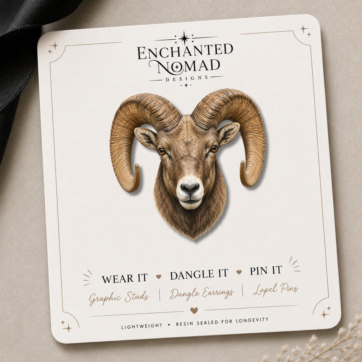 Bighorn Sheep Earrings & Pin on a branded display card