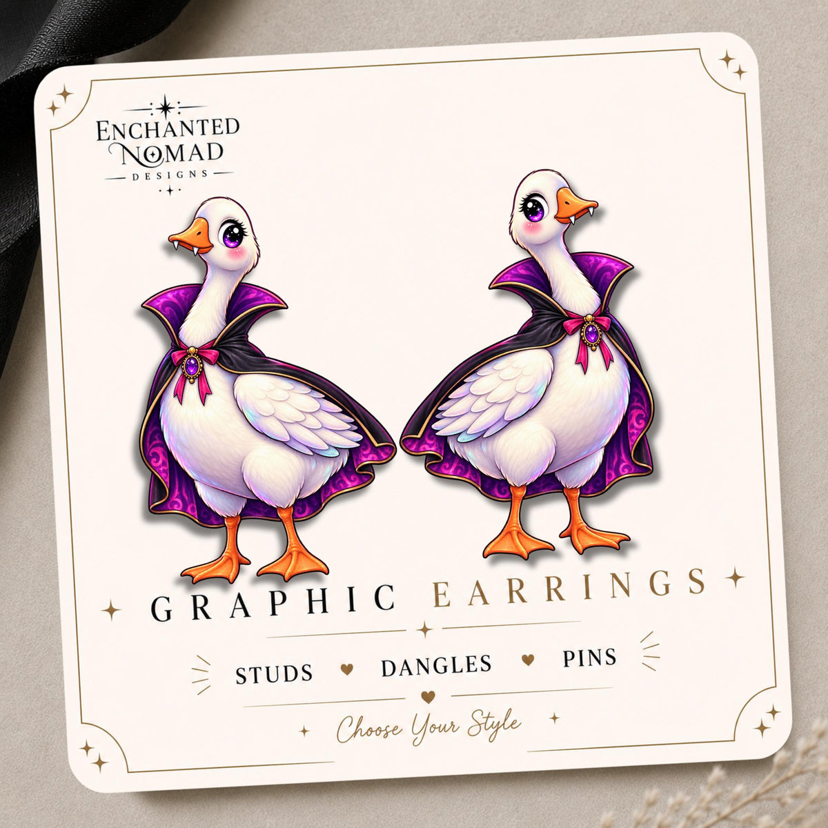 Vampire Goose Earrings & Pins on original display card
