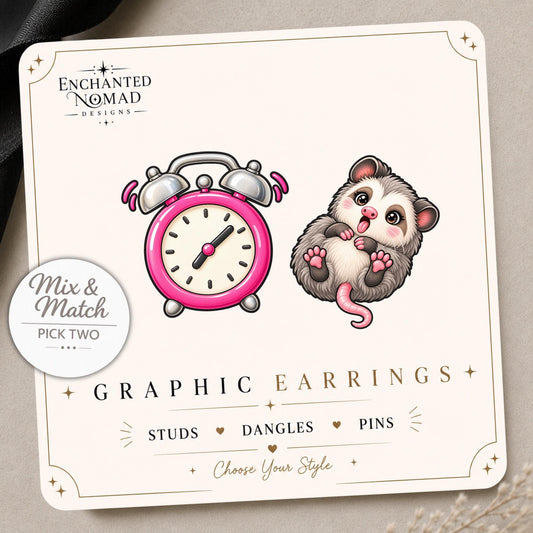 Opossum and Alarm Clock Earrings & Pins on a display card