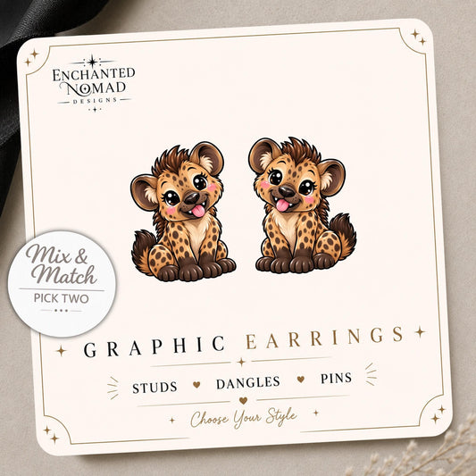 Spotted Hyena graphic earrings and pins on a display card