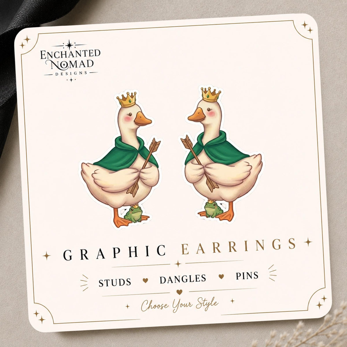 Crowned Archer Goose Earrings & Pins on original display card