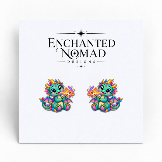Marshmallow Roasting Dragon graphic earrings on display card