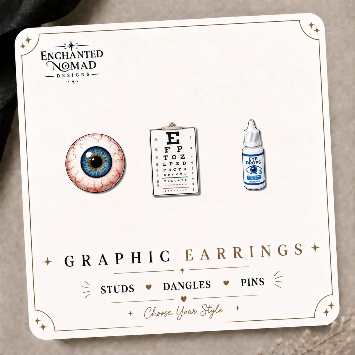 Mix & Match Eye Doctor Stud Earrings on the tilted Enchanted Nomad Designs card