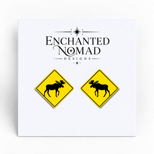 Moose Crossing Sign graphic earrings on display card