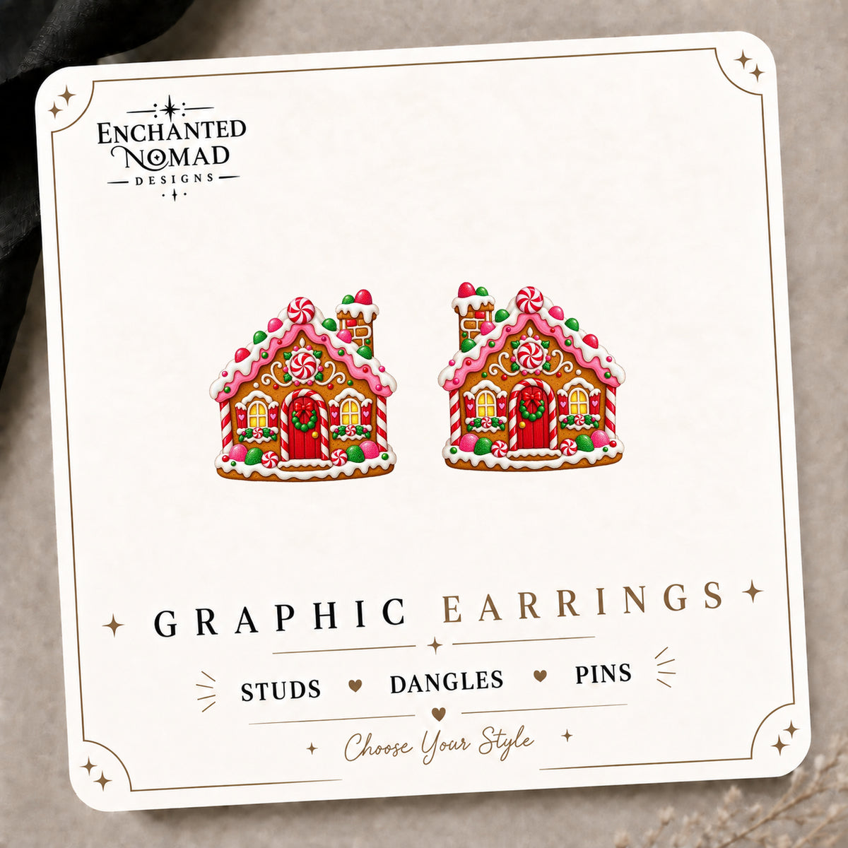 Pink Gingerbread House Stud Earrings on the tilted Enchanted Nomad Designs card