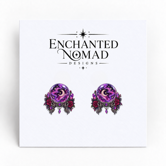 Purple Crystal Ball graphic earrings on display card