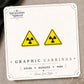 Radiation Warning Sign Stud Earrings on the tilted Enchanted Nomad Designs card