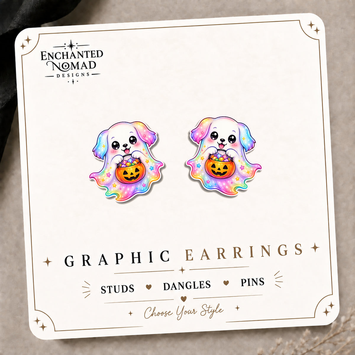 Rainbow Ghost Dog Stud Earrings on the tilted Enchanted Nomad Designs card