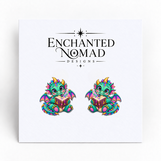 Reading Dragon graphic earrings on display card