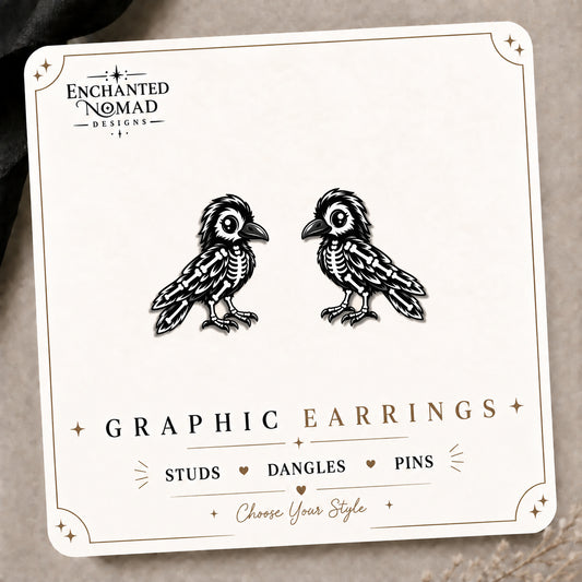 Skeleton Crow Stud Earrings on the tilted Enchanted Nomad Designs card