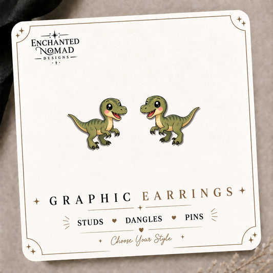 T Rex Stud Earrings on the tilted Enchanted Nomad Designs card