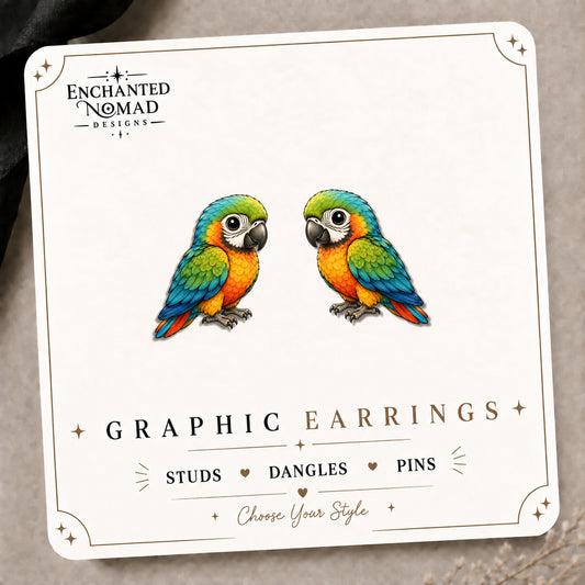 Vibrant Parrot Stud Earrings on the tilted Enchanted Nomad Designs card