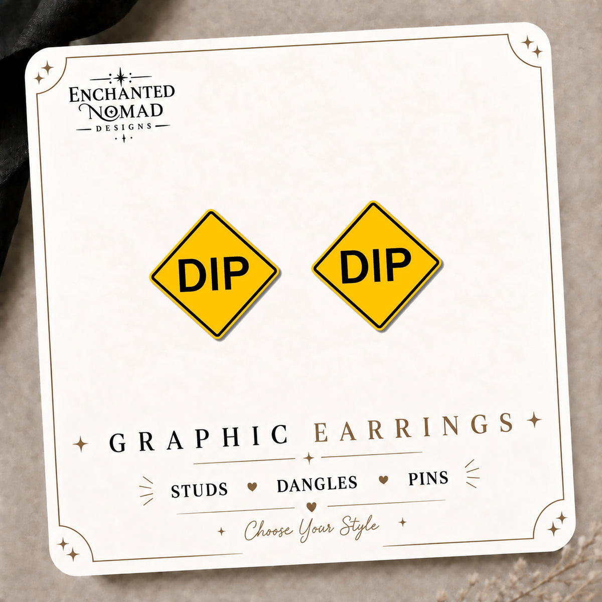 Yellow DIP Road Sign Stud Earrings on the tilted Enchanted Nomad Designs card